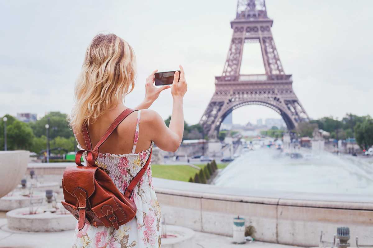 esim phone eiffel tower shutterstock 424114555 song about summer